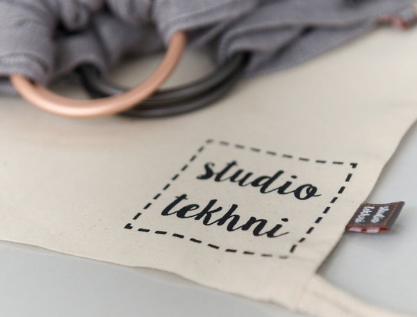 Studio Tekhni - The Sling Baby Carrier | Graphite + Grey - Crunch Natural Parenting is where to buy